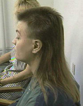 1991 Ford Bronco - Side profile of a person with a distinctive mullet hairstyle.