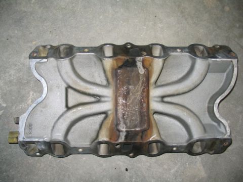 1979 Ford F-150 - Aluminum intake manifold with cast runners and a welded center section, likely for a V8 engine.