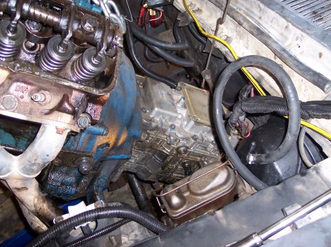 1967 Ford Mustang - Engine bay detail with visible engine components and wiring.