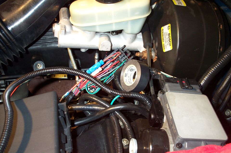 I used wiring looms and electrical tape to clean up the wiring install and to give a factory appearance.