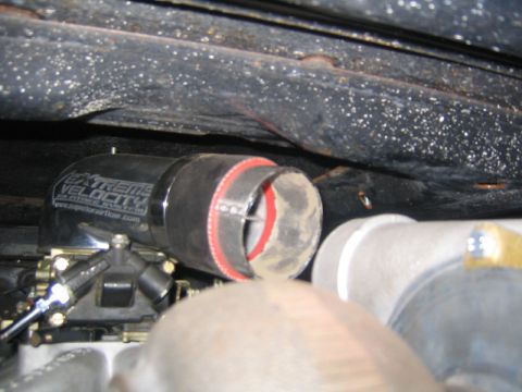 1969 Ford Mustang - Close-up of an aftermarket air intake system, showing the 'EXTREME VELOCITY' branding.
