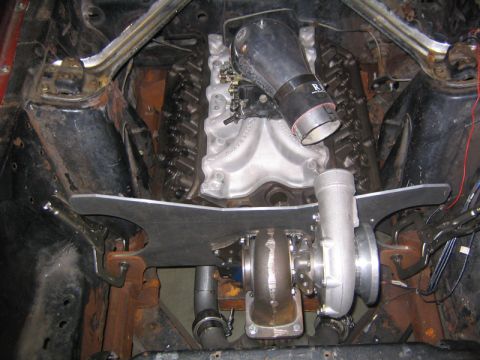 1969 Ford Mustang - Custom turbocharger setup installed in the engine bay of a 1969 Ford Mustang.