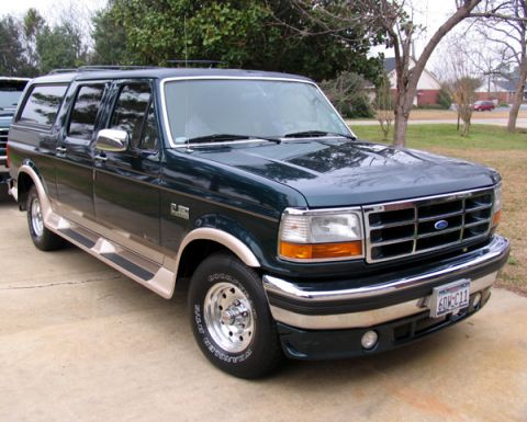 1995 Ford C-150 (Centurion Conversions) - This Ford SUV conversion features a grille and body style consistent with the early to mid-1990s.