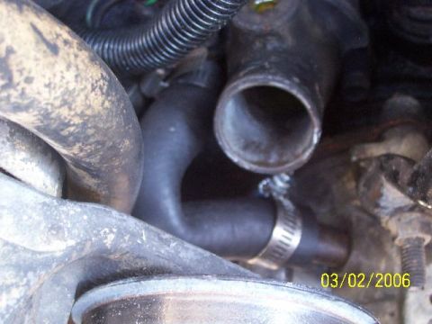 1987 Ford Bronco - New hose. I can't seem to get it on any farther than this.