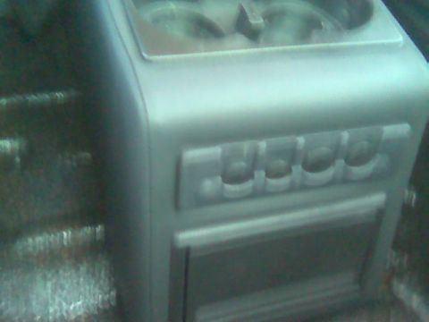 1992 Ford Bronco - Interior view of a vehicle's center console, showing switches and cup holders.