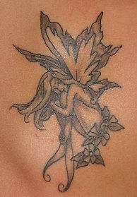 2004 Ford F-150 - Tattoo artwork of a fairy, with a SuperMotors logo visible.