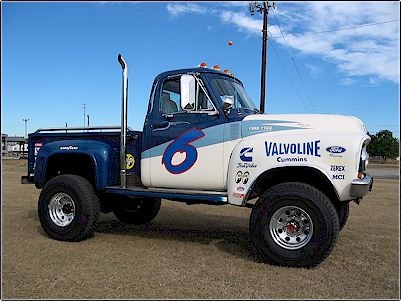 1971 Ford Ranchero - Customized 1956 Ford F-100 pickup truck with racing graphics and a tall exhaust stack.