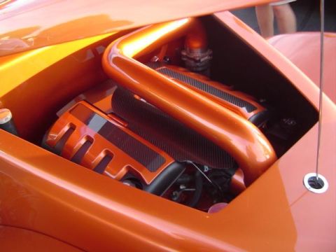 1979 Ford Bronco - Custom engine bay with orange paint and carbon fiber accents.