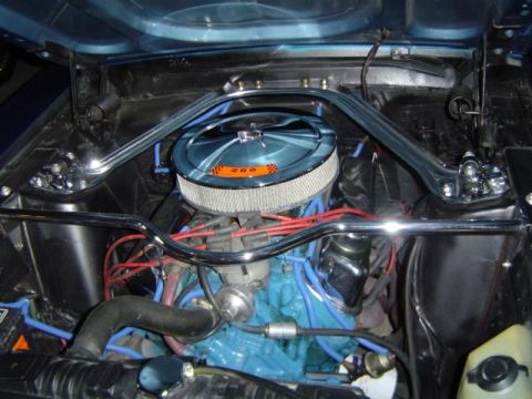 1979 Ford Bronco - The engine bay features chrome strut braces and an aftermarket air cleaner with a visible '209' label.