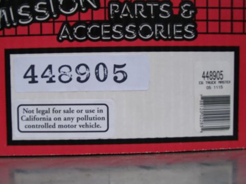 1984 Ford Bronco - A box labeled with part number 448905 and a warning about sale or use in California on pollution-controlled vehicles.