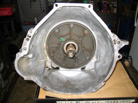 1984 Ford Bronco - Bell housing for an automatic transmission, showing the input shaft opening and mounting points.
