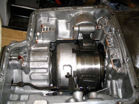 1984 Ford Bronco - Close-up view of the internal workings of an automatic transmission, showing the torque converter and gears.