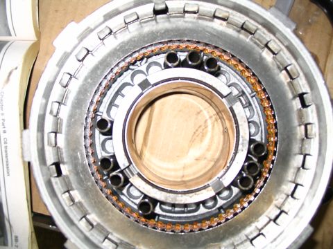 1984 Ford Bronco - Close-up of a transmission drum assembly, revealing internal components and signs of use.