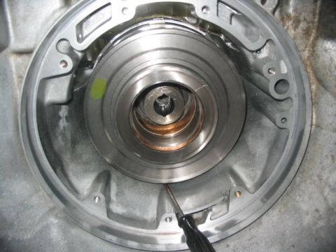 1984 Ford Bronco - Close-up view of an automatic transmission torque converter housing, showing internal components.