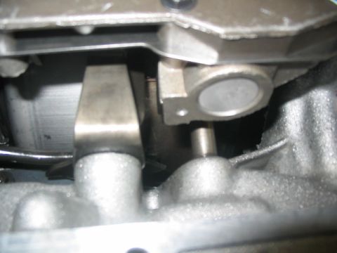 1984 Ford Bronco - Close-up view of the internal components of a transmission shift linkage.