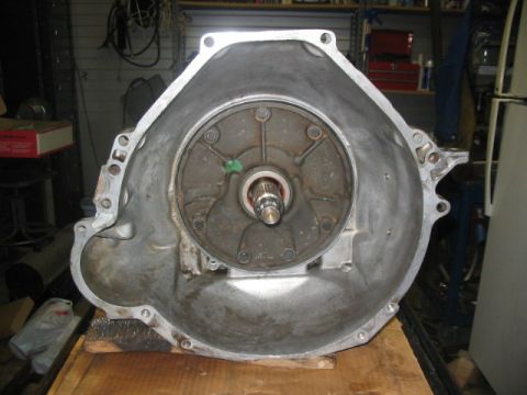 1984 Ford Bronco - Close-up view of a transmission bell housing, showing the input shaft and mounting points.