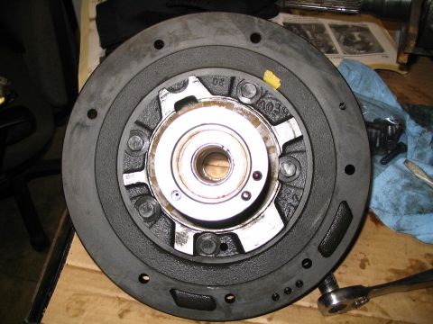1984 Ford Bronco - Close-up of a crankshaft pulley, showing part number 4039 and mounting holes.