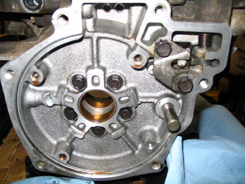 1984 Ford Bronco - Close-up view of a vehicle's transmission housing, showing internal mechanical parts and fasteners.