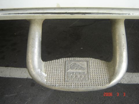1993 Ford Bronco - Close-up of a vehicle's step with "Steel Horse Automotive" branding visible.