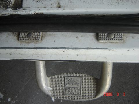 1993 Ford Bronco - A close-up shows the 'Steel Horse Automotive' logo on a vehicle's step.