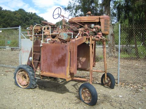 1968 Ford Mustang - This heavily rusted machine appears to be a tractor, not a car, and its model year is indeterminate.
