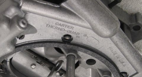 1991 Ford LTD Crown Victoria - macro shot of the Carter Thermo-Quad and Made in USA lettering cast into a carburetor body.