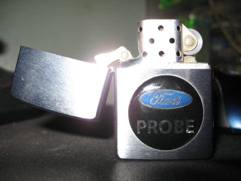 1996 Ford Probe - A chrome lighter displays the Ford logo above the word PROBE.