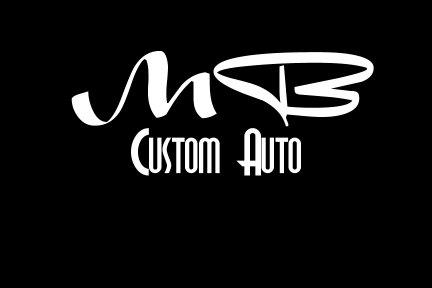 1994 Ford Probe - Logo for MB Custom Auto, a business that appears to be related to vehicles.
