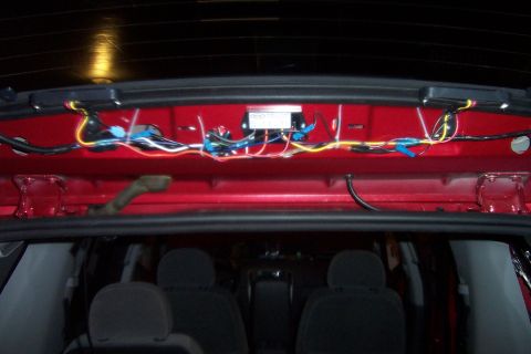 2005 Ford Explorer - Wiring and a control module are visible in the interior of a 2005 Ford Explorer.