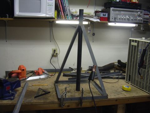 1991 Ford Bronco - Workshop scene with a metal fabrication project and various tools.