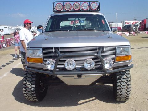 1984 Ford Bronco - Modified Ford Bronco, likely a 1992-1996 model, equipped for off-road use.