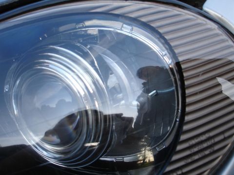 1993 Ford Taurus - Headlight assembly detail showing internal components and clear lens.