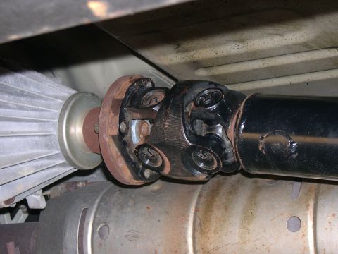 2000 Ford Excursion - Custom High Angle Driveline double carden drive shaft at trans output.