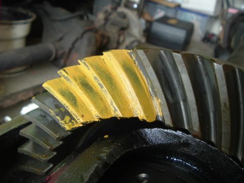 1989 Ford Bronco - Close-up of a worn differential gear, indicating potential mechanical issues.