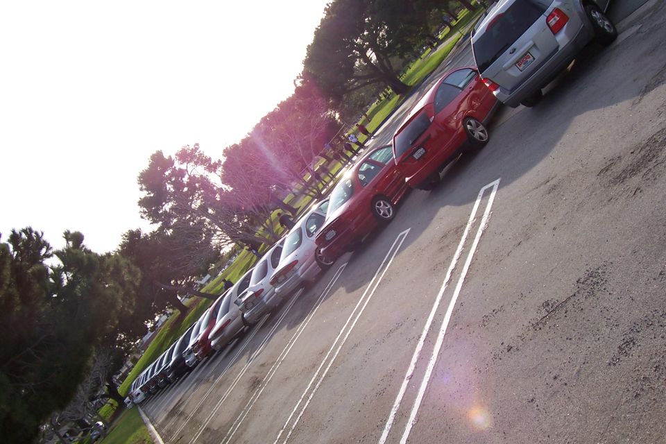 1998 Mercury Sable and other cars parked in a line