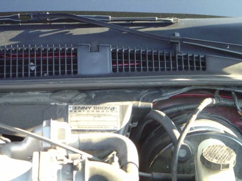 1998 Ford Crown Victoria - A plaque from Kenny Brown Performance is visible in the engine bay, with a Supermotors.net watermark.
