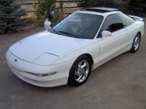 1996 Ford Probe - A white 1996 Ford Probe is shown from a three-quarter front angle.