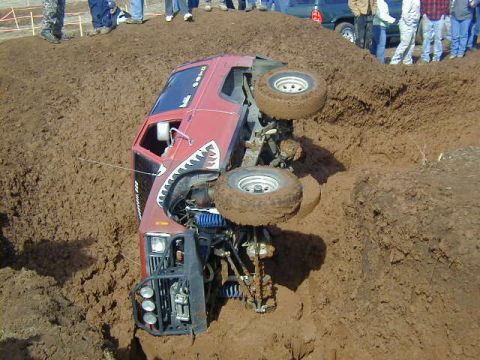 1994 Ford Explorer - Off-road vehicle overturned in mud during an event.