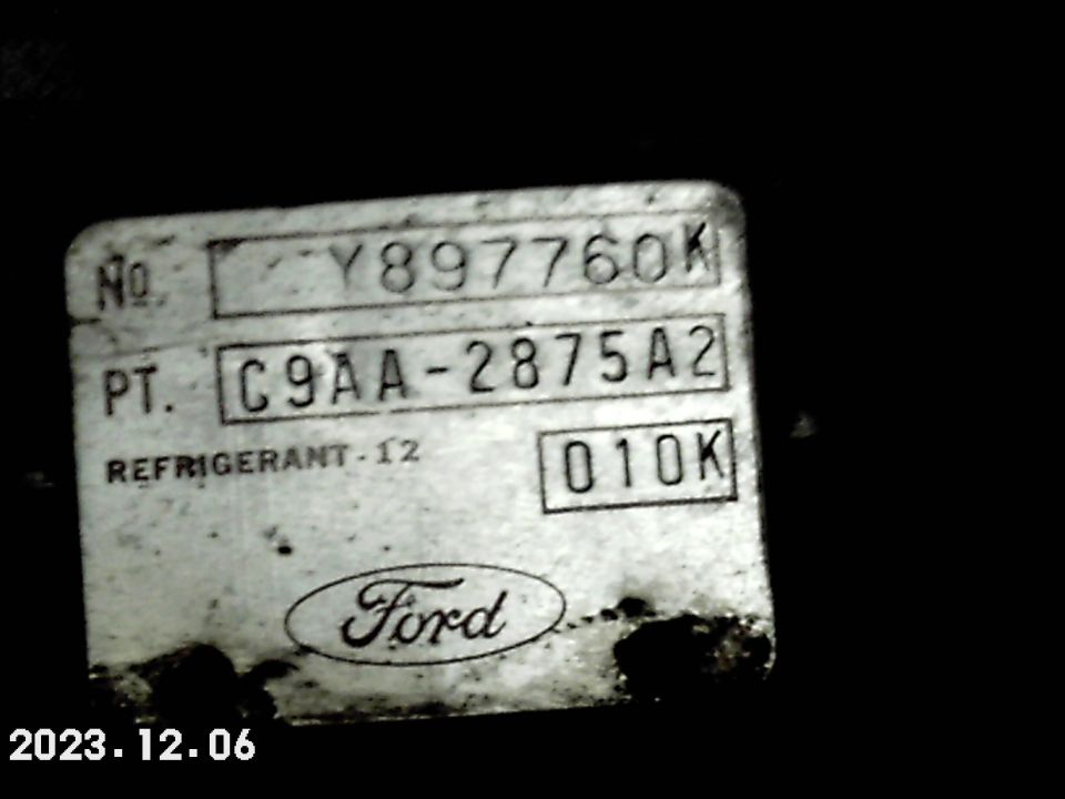 Ford part tag with part number C9AA-2875A2 and number Y897760K