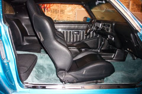 1979 Pontiac Trans Am - Interior view of a 1979 Pontiac Trans Am, showing the front seats and dashboard.
