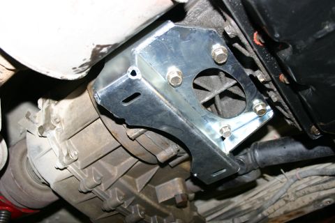 2003 Jeep TJ - Close-up view of a Jeep TJ transmission crossmember mount bracket.