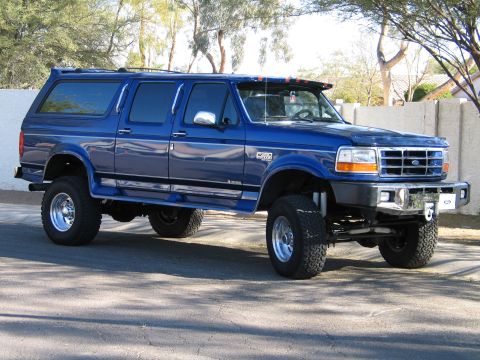 1996 Ford C-350 (Centurion Conversions) - This modified SUV sits high on its suspension, ready for adventure.
