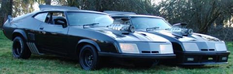 1972 Ford Ranchero - Two heavily modified coupes with prominent superchargers are parked side-by-side outdoors.