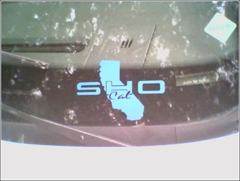 1993 Ford Taurus - The interior dashboard features a SHO Cal sticker overlaying the state of California, with an AIR BAG warning label visible.