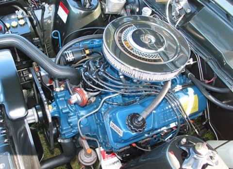 1972 Ford Ranchero - Engine bay details with a blue V8 motor and chrome air filter housing.