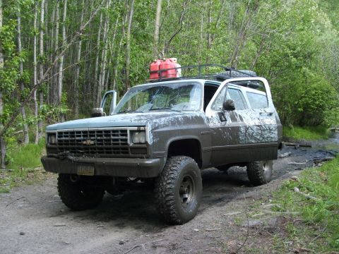 1990 Chevrolet Suburban - This 1990 Chevrolet Suburban is equipped for off-road adventures with large tires and extra fuel cans.