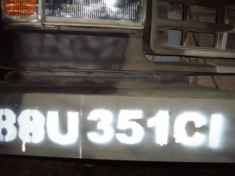 1988 Ford Bronco - Front bumper of a 1988 Ford Bronco shows stenciled identification numbers.