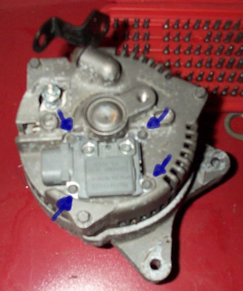 1993 Mercury Grand Marquis - Remove the 4 screws that the blue arrows point too. (T20 torx bit)