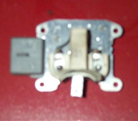 1993 Mercury Grand Marquis - This is the brush assembly bolted in place on the back of the voltage regulator