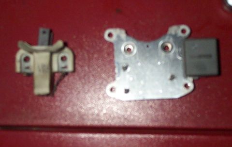 1993 Mercury Grand Marquis - When you remove the 2 screws....the brush assembly simply comes off of the regulator